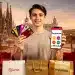 Persona mostrando tarjetas de fidelización y una aplicación de descuentos, con símbolos de ahorro en el fondo, representando programas de puntos y descuentos combinados en España.